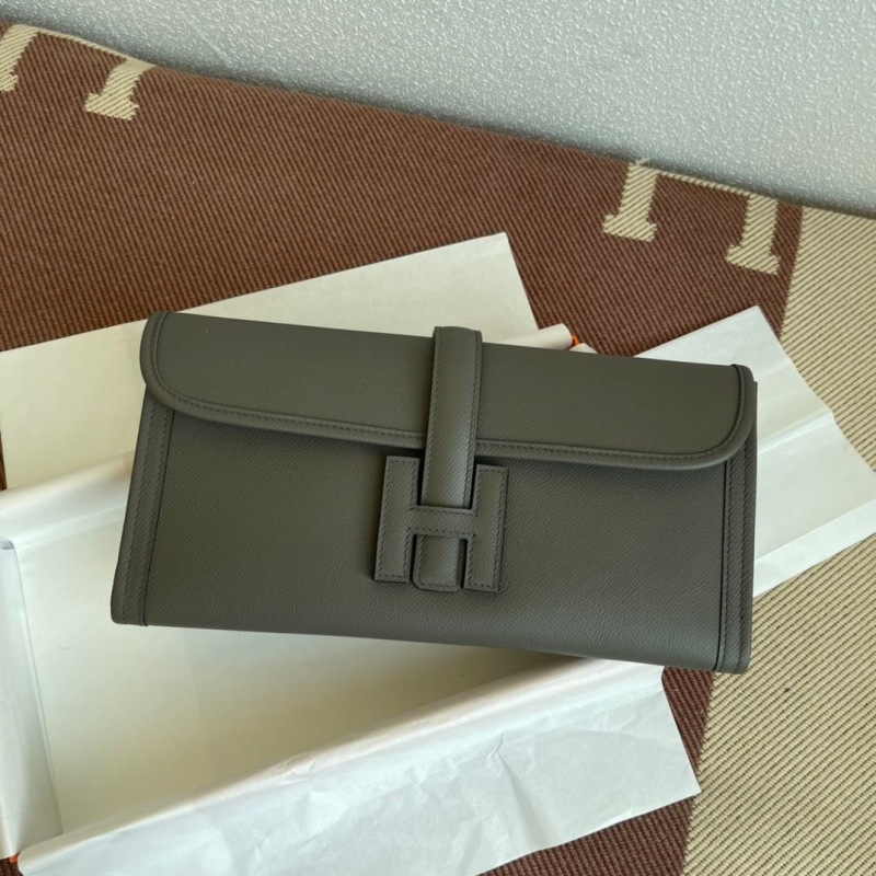 H**mes clutch bags